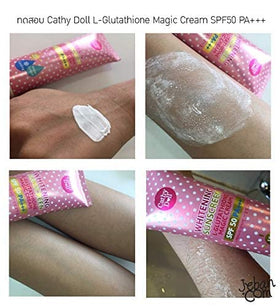 Cathy Doll tube beside hand for scale to show generous 138ml size