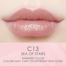 Catkin open twist-up stick revealing balm tip, easy precise application benefit
