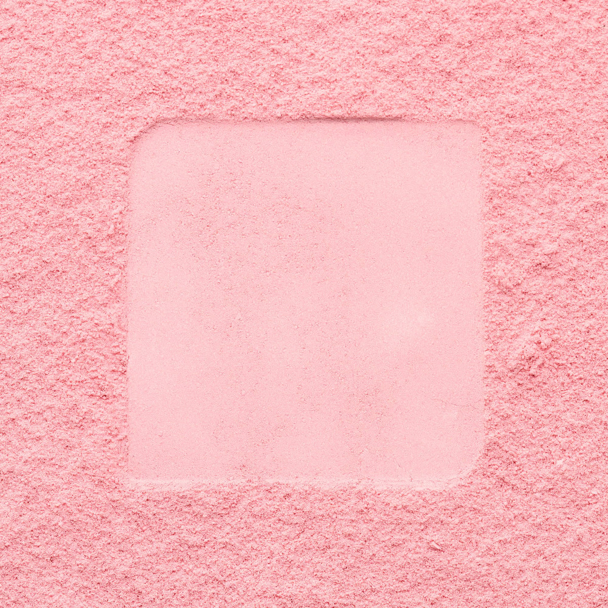 Catrice powder beside coin for size comparison and travel convenience