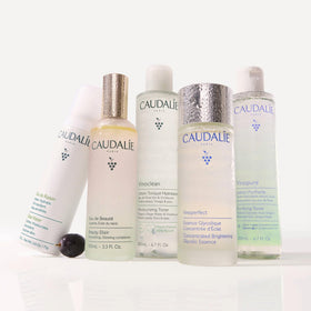 Caudalie toner on cotton pad demonstrating effective makeup residue removal