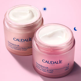 Caudalie jar beside common objects to show 50 mL size and travel-ready benefit