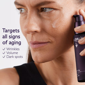 Caudalie serum pipette dispensing a controlled drop for precise use