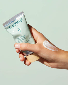 Caudalie Vinoclean application in hand demonstrating gentle exfoliant coverage benefit