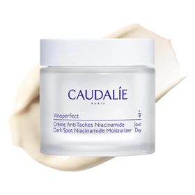 Caudalie jar front view showing brand and compact benefit