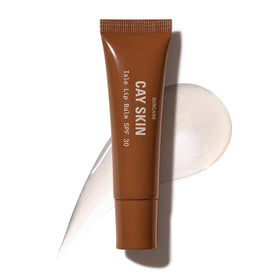 Cay Skin front packaging showing clear high-shine lip balm and SPF benefit
