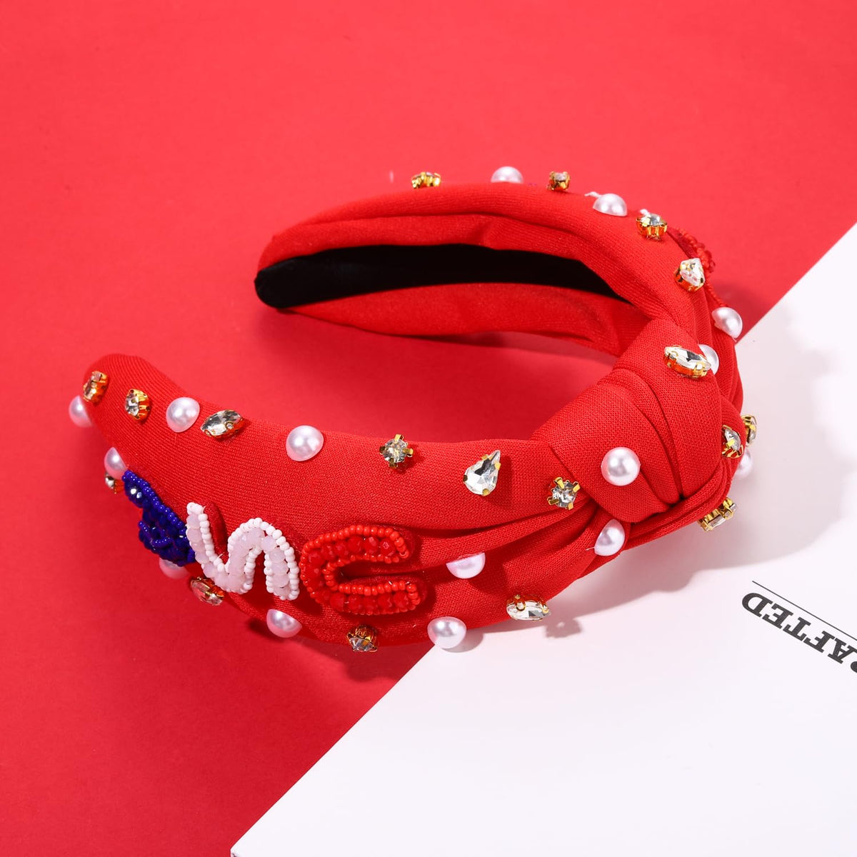 CEALXHENY headband on hand for size scale illustrating compact, lightweight, wearable design