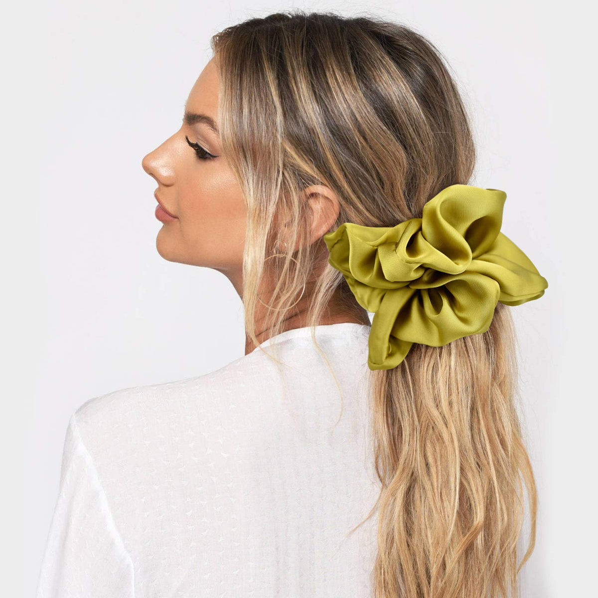 CEELGON jumbo scrunchie securing long curly hair with secure, crease-free hold benefit