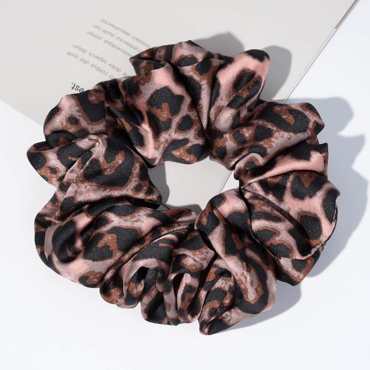 CEELGON scrunchie in a high ponytail demonstrating firm hold without creases