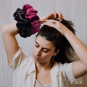 CEELGON scrunchie held in hand for scale shows extra-large size advantage