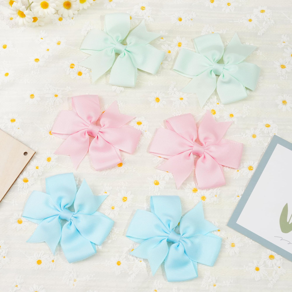 CÉLLOT child wearing a bow in a ponytail showing everyday wearable styling