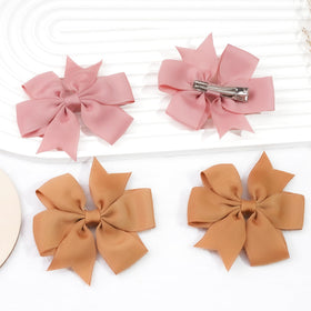 CÉLLOT storage organizer with multiple bows demonstrating easy storage