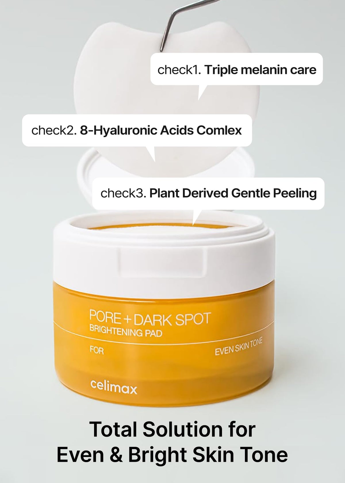 celimax applying pad to cheek for gentle exfoliation and brightening