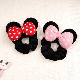 CellElection scrunchie worn by child at a theme park adding fun costume flair