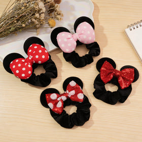 CellElection scrunchie holding a ponytail demonstrating secure hold and comfortable fit