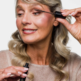 Cellmetics mascara applied on lashes closeup demonstrating lengthening and natural definition