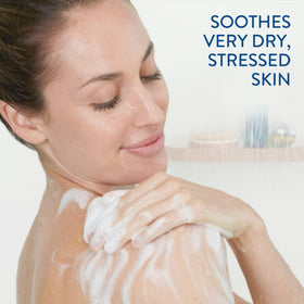 Cetaphil RestoraDerm bottle in hand to show 10 oz scale and travel convenience