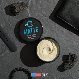 Challenger jar next to carry-on essentials showing travel-friendly size