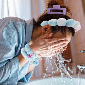 Chanaco headband next to hand to show size and fit benefit