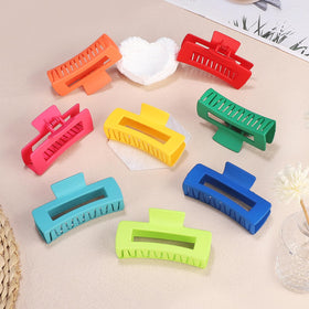 CHANDAT flatlay displaying all eight clip colors for easy outfit coordination