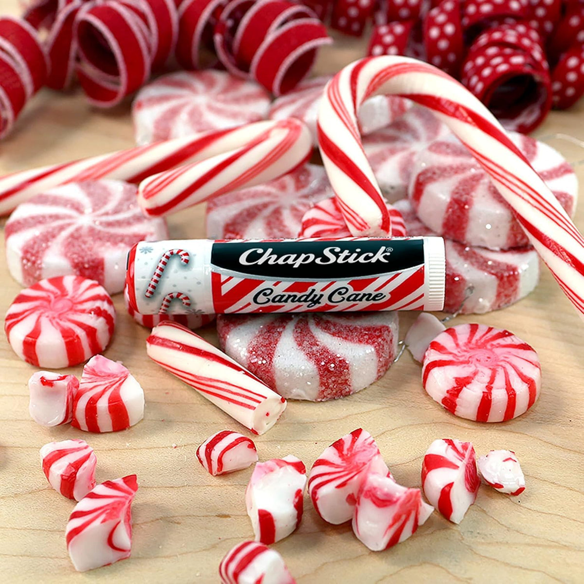 Open cap view of ChapStick Candy Cane texture illustrating creamy glide and non-greasy finish