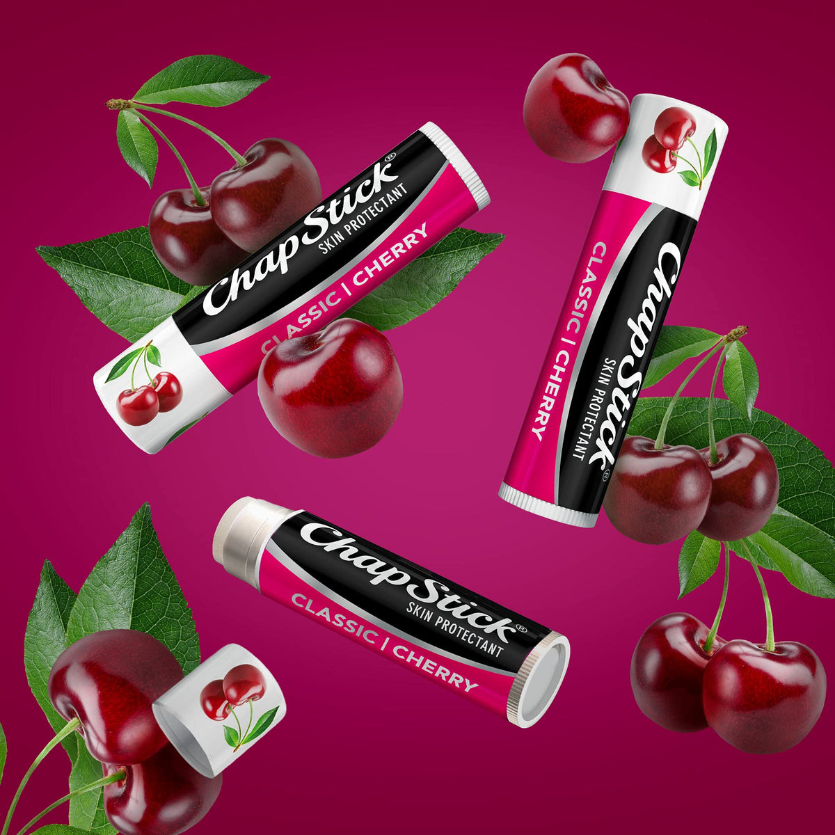 Single ChapStick cherry tube upright showing slim stick design and portability