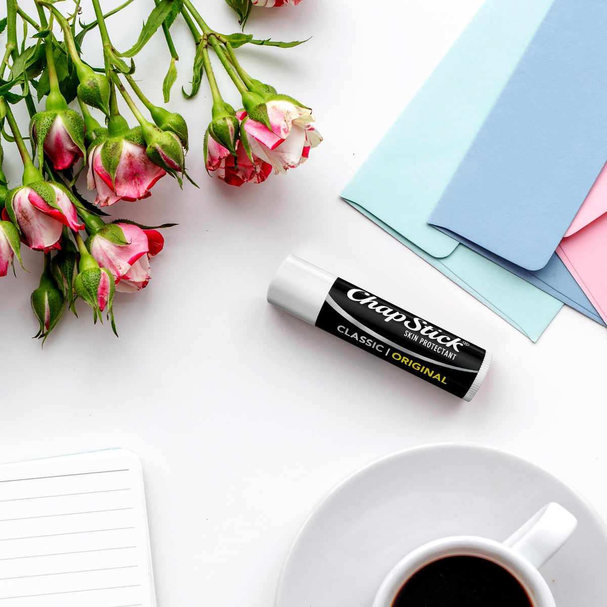 Open ChapStick Classic tube with cap off showing twist-up mechanism for convenience
