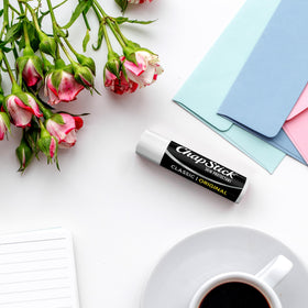 Open ChapStick Classic tube with cap off showing twist-up mechanism for convenience