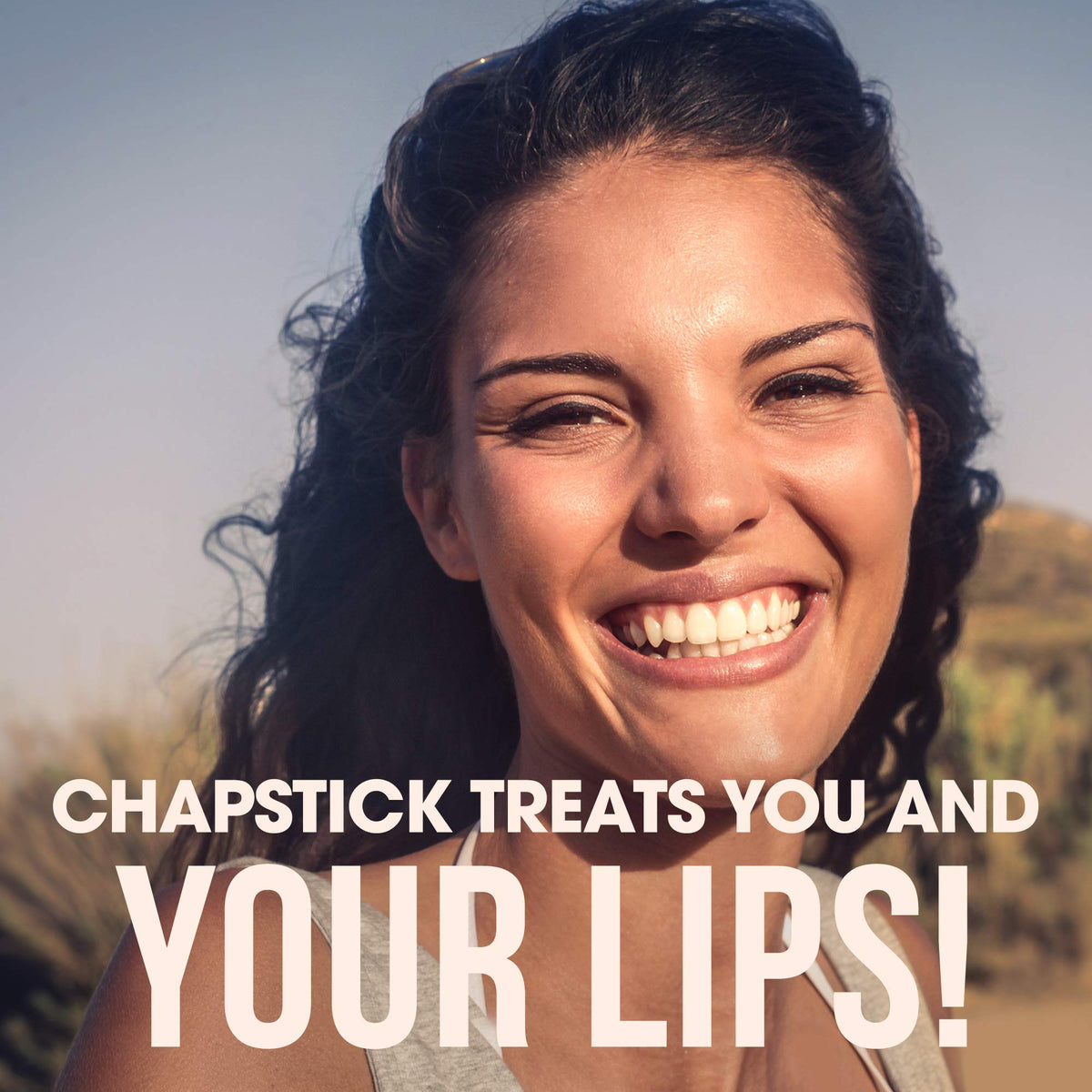 ChapStick in a pocket beside keys illustrating portability and on-the-go protection