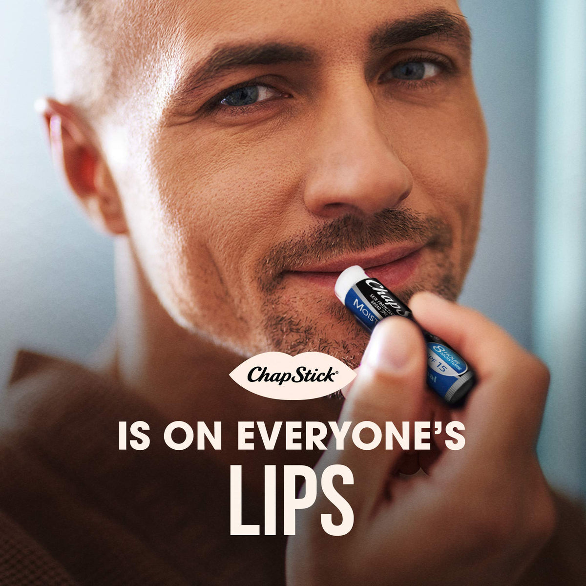 ChapStick in a sunlit jacket pocket illustrating outdoor lip protection