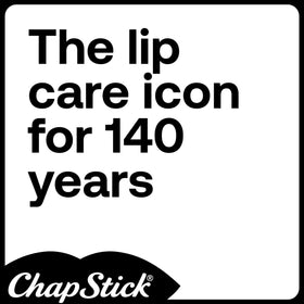 ChapStick Minions next to a coin showing compact 0.15 oz travel size