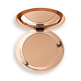 Charlotte Tilbury compact front view showing sleek case and portability benefit