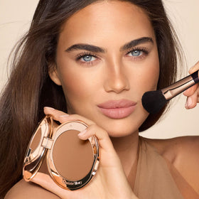 Charlotte Tilbury bronzer open with refill pan highlighting sustainable refill option