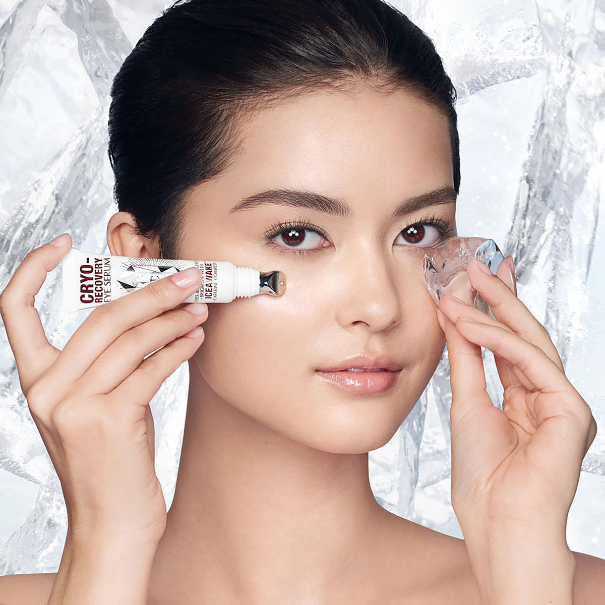 Charlotte Tilbury applicator massaging under-eye to help reduce puffiness