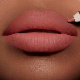 Charlotte Tilbury arm swatch demonstrating Pink Venus color payoff and blendability
