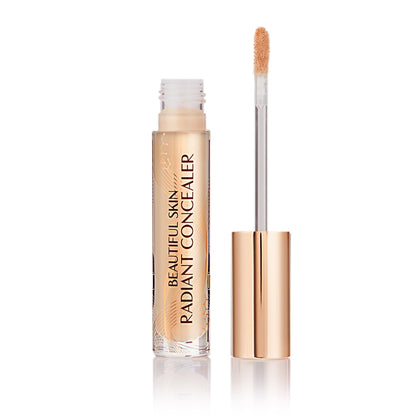 Charlotte Tilbury front packaging showing sleek concealer tube and branding benefit brightening