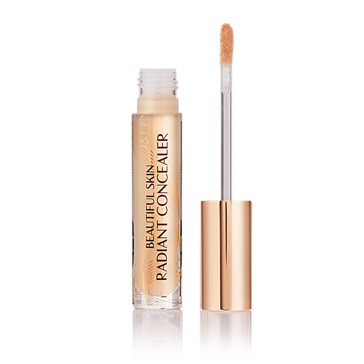 Charlotte Tilbury front packaging showing sleek concealer tube and branding benefit brightening