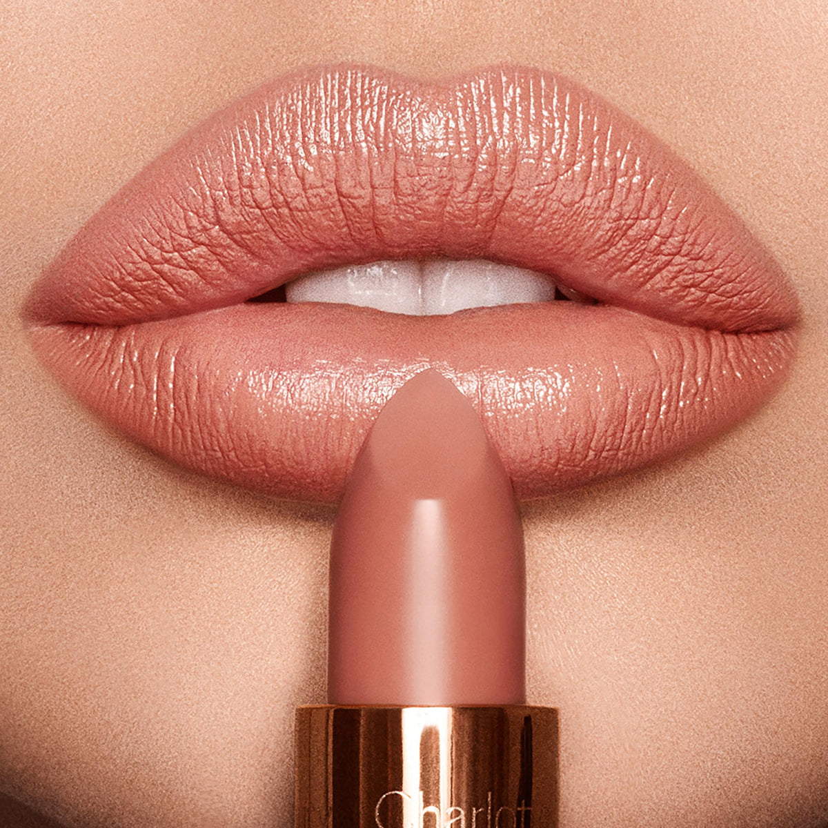 Charlotte Tilbury application with liner demonstrating precise, defined lip shape