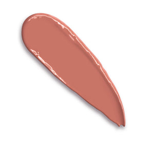 Charlotte Tilbury swatch of Bitch Perfect on skin demonstrating true peach-nude tone