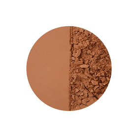 Charlotte Tilbury brush sweeping bronzer showing easy buildable application