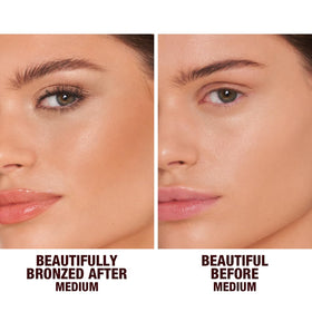 Charlotte Tilbury bronzer being applied to cheek with brush to create a natural sun-kissed contour