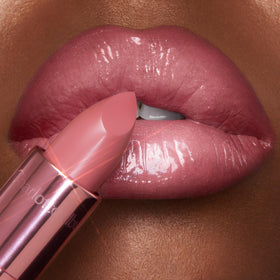 Charlotte Tilbury candy chic paired with Lip Cheat liner to demonstrate shaping and definition