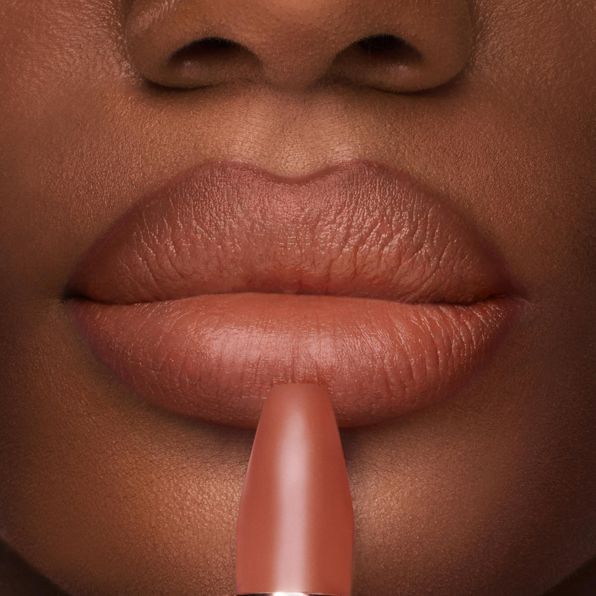 Charlotte Tilbury lipstick applied from hand showing easy, precise application