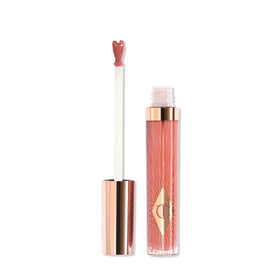 Charlotte Tilbury front packaging showing glossy Pillow Talk Medium benefits