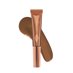 Charlotte Tilbury front view of tube showing elegant packaging and easy application benefit