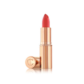 Charlotte Tilbury Coral Kiss front bullet showing sleek casing and coral shade for instant polish