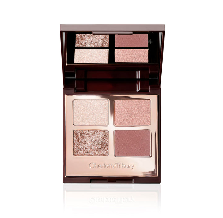 Charlotte Tilbury palette front view showing four rose-gold shades and compact mirror for versatile looks