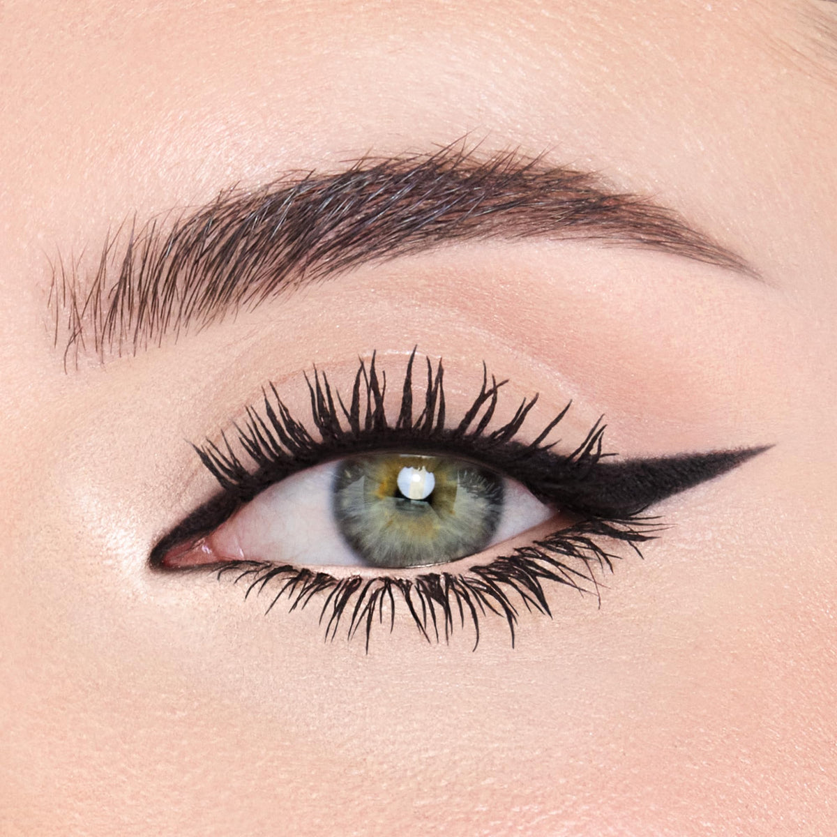 Charlotte Tilbury liner in use on inner corner delivering instant lift and glow