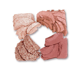 Hand holding compact to show scale and travel-friendly size for touch-ups on the go