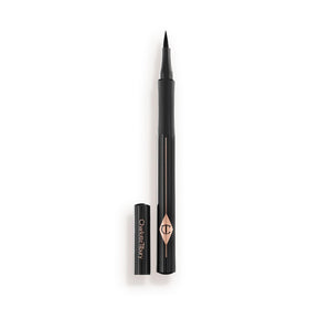 Charlotte Tilbury Feline Flick front packaging showing sleek pen design and label, precise application benefit