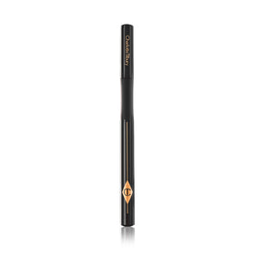Charlotte Tilbury Feline Flick size comparison beside common cosmetic to show compact, travel-friendly benefit